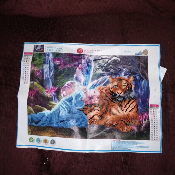 Completed fairy and tiger diamond art
